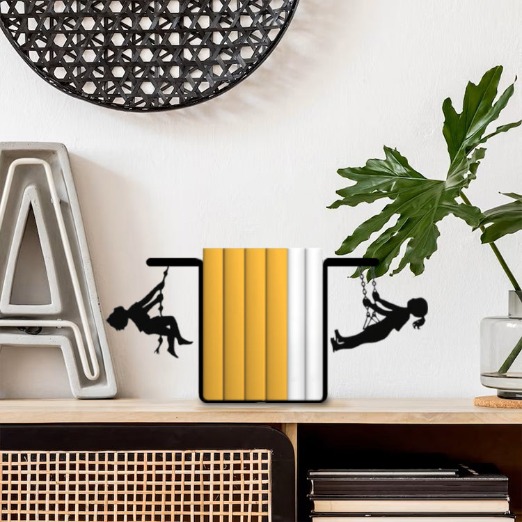 Bookend with Figured Children Swinging on a Swing